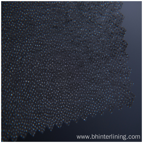 Shrink resistant double dot non woven fusible interlining